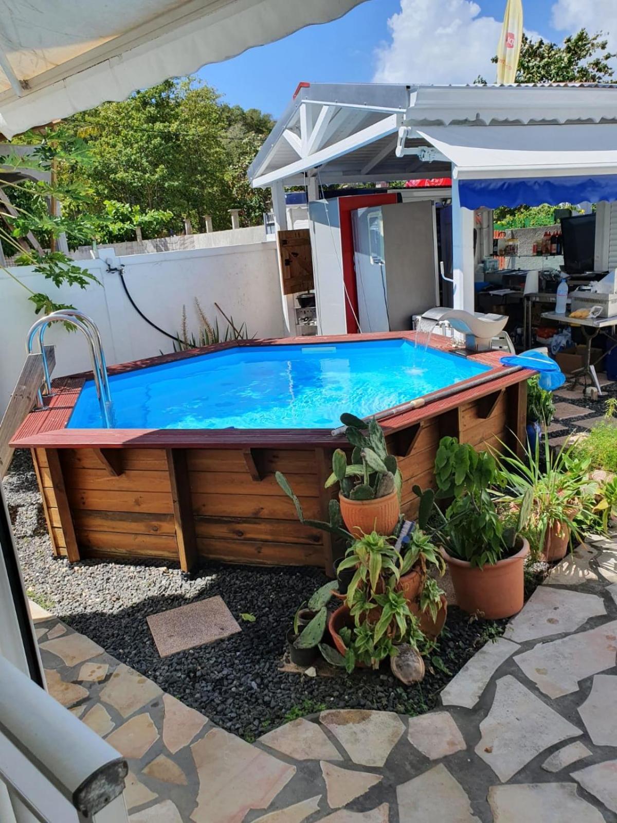 Le Sable Bleu - Evasion Tropicale A Sainte-Anne - Plage 5Min - Piscine - Parking - Logement Climatise - Vue Sur Les Palmiers - Parfait Pour Sejours En Famille Ou Entre Amis Buitenkant foto